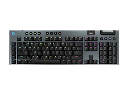 Low-profile Logitech G gaming keyboard with illuminated keys in a dark studio composition